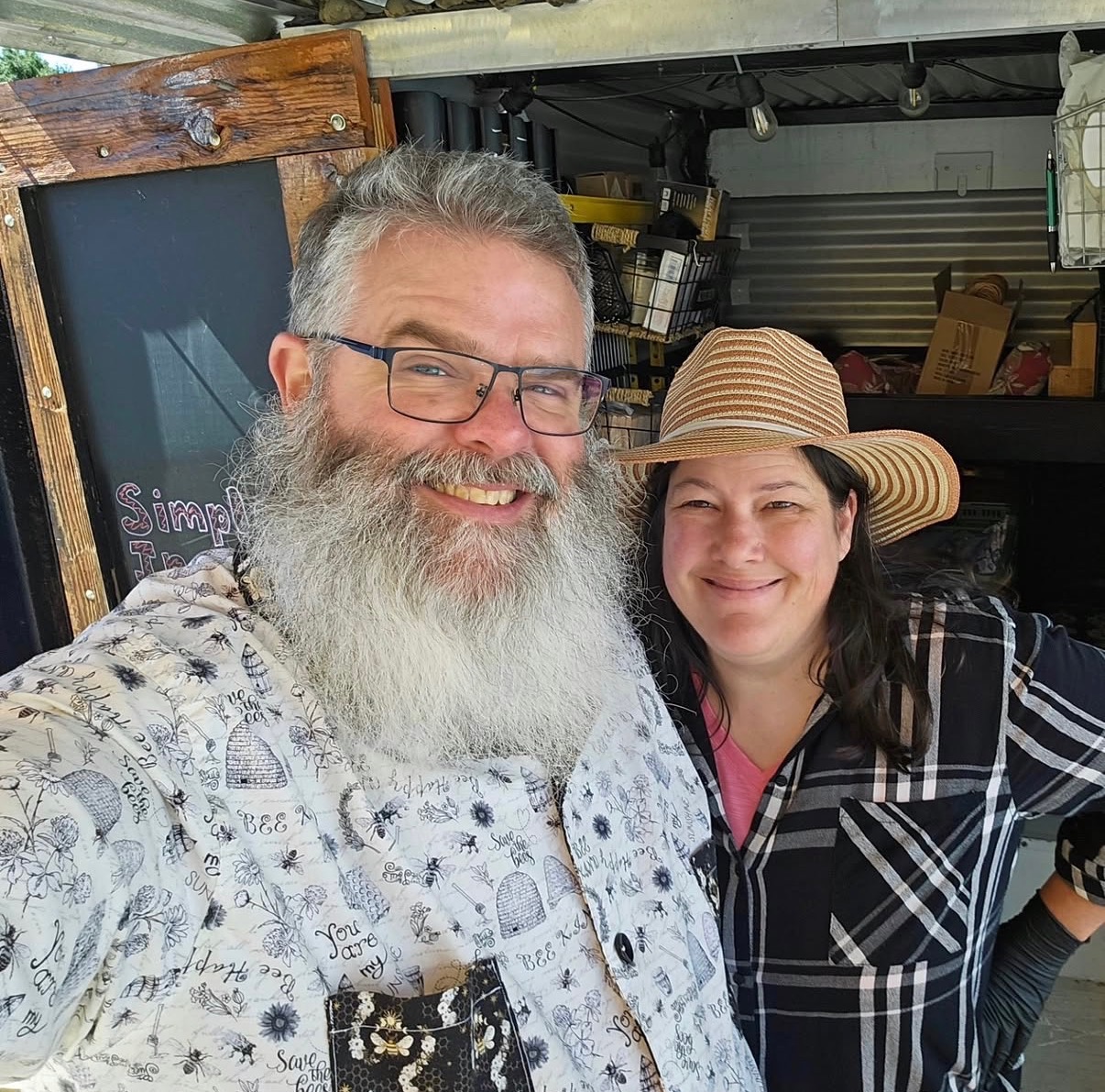 Gerald and his partner at the BeeBitas market stand